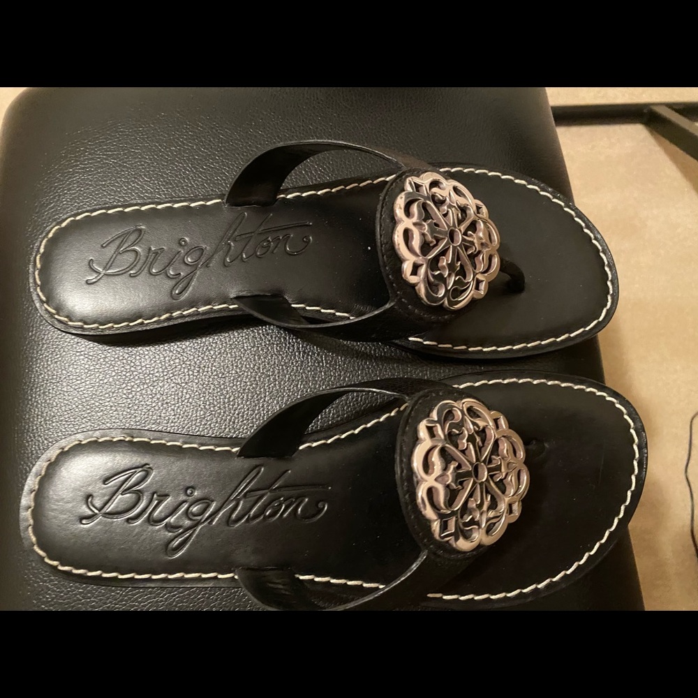 Black sandals with silver embellishment